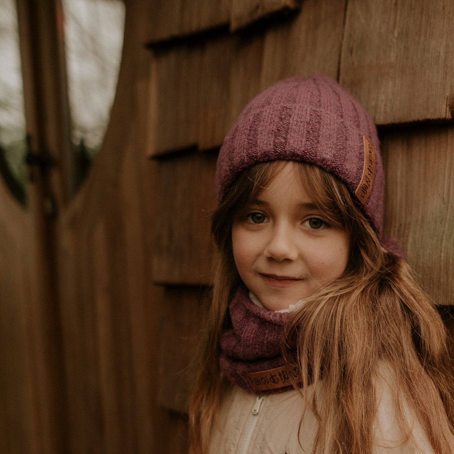 Bonnet enfant en laine parme
