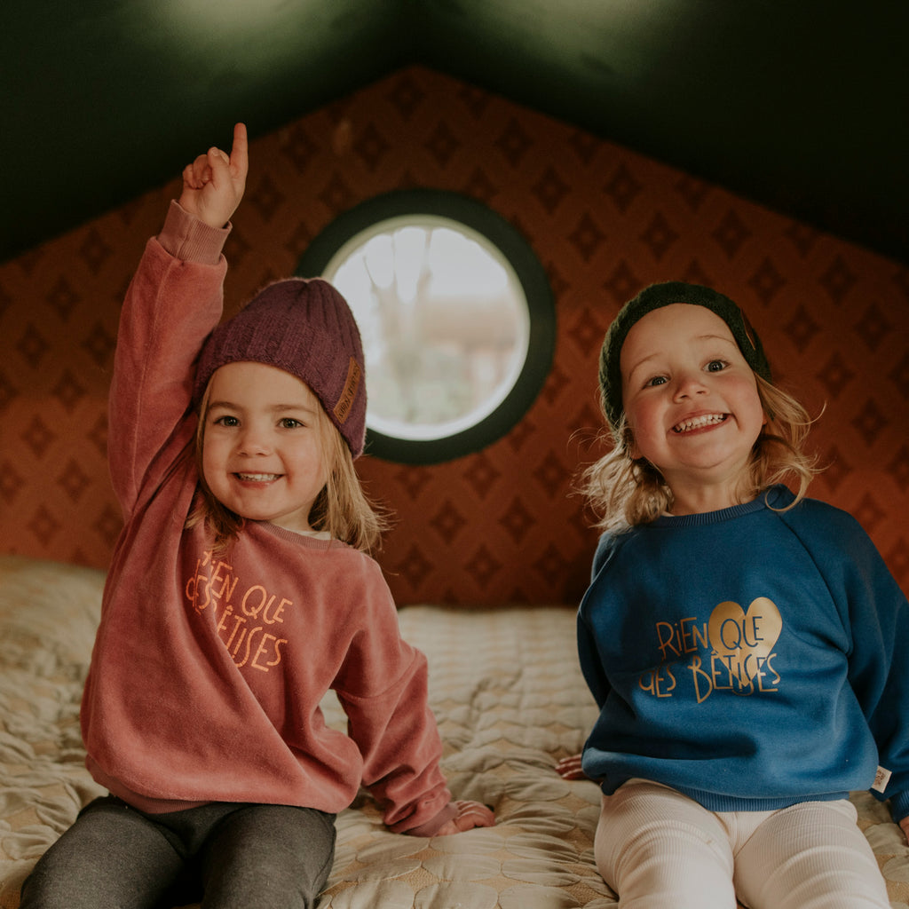 Bonnet enfant en laine parme