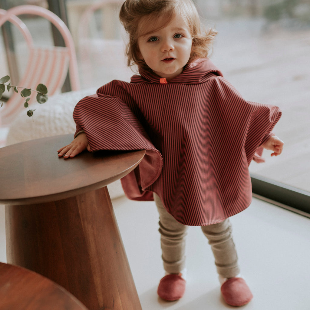 Poncho de pluie rose
