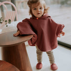 Poncho de pluie rose