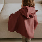 Poncho de pluie rose