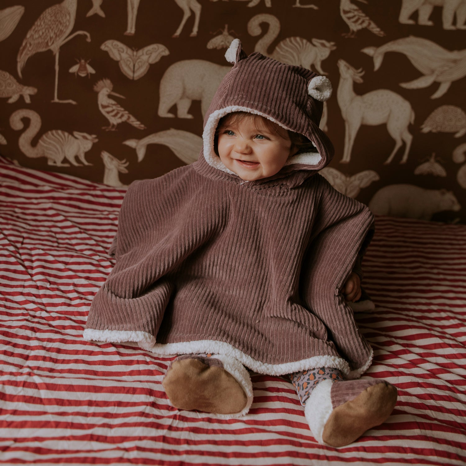 Poncho bébé velours parme