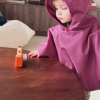 Poncho de pluie rose